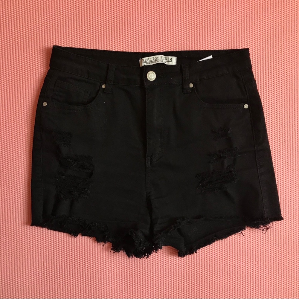 Distressed denim shorts